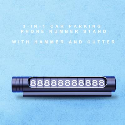 China 3-in-1 Multi Function Metal Car Phone Number Temporary Parking Platinum Holder With Car Security Hammer And Cutter for sale