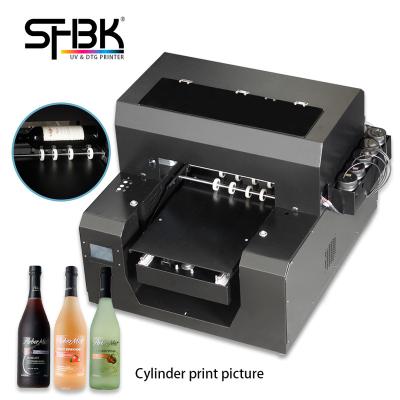 China Hotels UV Printing Machine For Wine Capsules Jars Cola Bottles Coffee Cans Roll Holders A3 Plastic UV Printer for sale