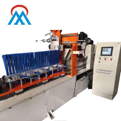 China For Drilling And Tucking CNC High Speed ​​2 Axis Industry Strip Brush 2 Heads Drilling And One Head Tucking Machine for sale