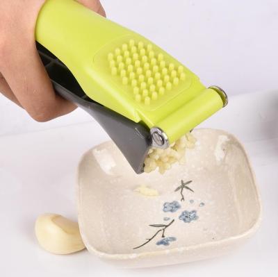 China Gray Green Salad Tools Easy Sustainable Kitchen Hand Held Garlic Press for sale