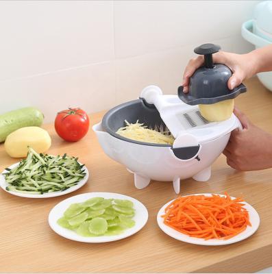 China Stocked 9 in 1 Manual Rotate Multifunctional Vegetable Cutter Veggie Chopper Slicer Grater with Drain Basket for sale