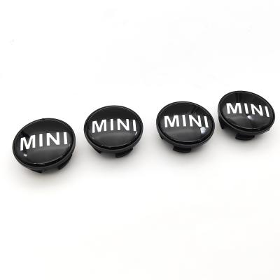 China ABS 4Pcs 54mm Racing Car Black Mini Logo Emblem Badge Wheel Center Hub Cap Cover Set for sale