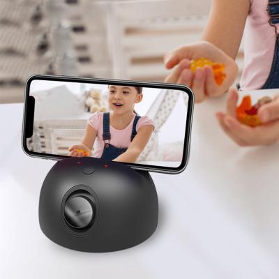 China Face Tracking Rotating Phone Holder NEW 360 Selfie Tracking Camera Standphone Tracking Holder 360 Rotation Smart Gimbal Stabilizer for sale