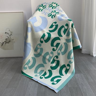 China Anti-Pull Recycle Cotton Throw Blanket GRS Cotton Knitted Jacquard Blanket for sale