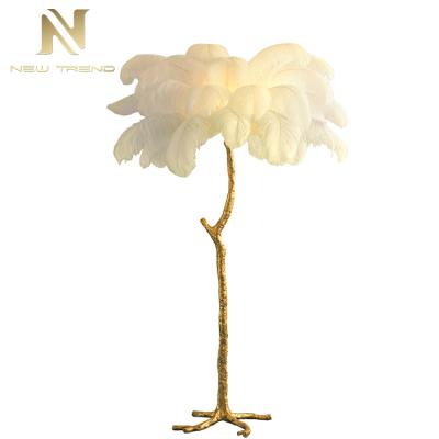 China High Quality Indoor Decorative Modern Palm Stand Copper Ostrich Feather Led Floor Light for sale