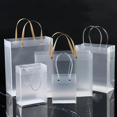 China Wholesale Plastic Frosted Advertising Handled PP Shopping Drink Drinking Clear Tote Bag Customized Color Pvc Gift Packaging Bag for sale