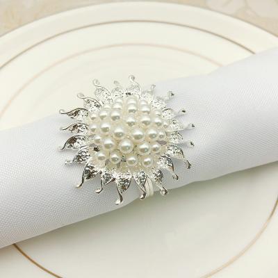 China Sparkly Rhinestone Wedding Silver Plated Napkin Ring Crystal Pearl Covered Napkin Holder Metal 50mm for sale