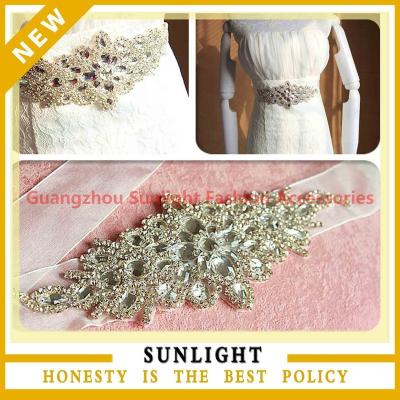 China Viable Wholesale Bridal Crystal Embellishments Rhinestone Appliques For Wedding Dresses for sale