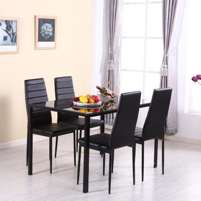 China Cooling Modern Cheap 120cm  Tempered Glass Top Rectangle Dining Tables And 4 PU Leather Chairs 4 Seater Dining Table Set for sale