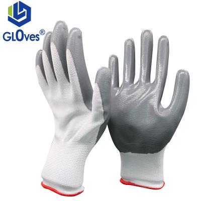 China LGSAFETY work safety wear resistant gloves 13 gauge white polyester lined en388 glossy gray palm coated nitrile for sale