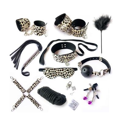 China SM Flirting Poles 10pcs Leopard Print Bondage Set Woman Man BDSM Game Whip Handcuffs Gay Adult Sex Toys for sale