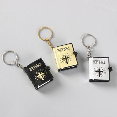 China Plastic Custom Collect Small Holly Bible Mini Pocket Quran Miniature Book Shaped Key Chain Charms Gift for sale