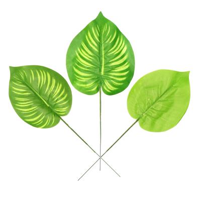 China Modern Simple Artificial Flower Arrangement Table Decoration Garden Wall Plant Leaves Artificial Palm Leaves Outdoor for sale