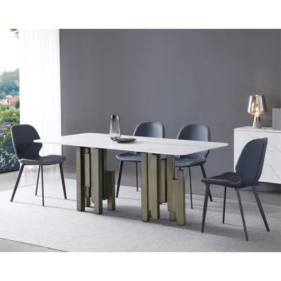 China Modern Luxury Steel Marble Stone Dining Table Entryway Lux Carbon Leg Metal Top Dining Tables for sale