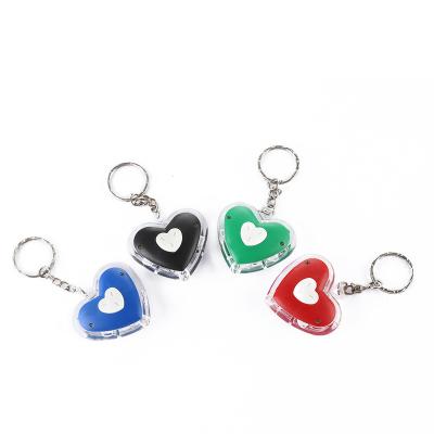 China Portable Key Person Chain Heart Shape Mini LED Flashlight Colorful Small Key Ring Light For Gift for sale