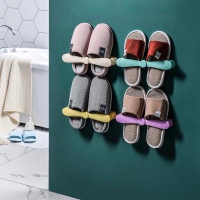 China Convertible Modern Simple Bathroom Slippers Storage Shoe Rack Perforated Retractable Plastic Shoe Rack Wall Mounted Shoe Rack for sale