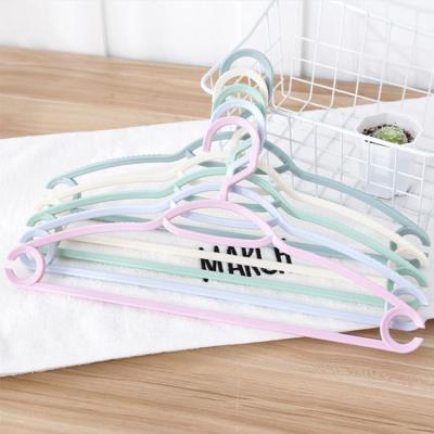 China Contemporary cheap non-slip acrylic stock plastic trouser shop hangers for clothes for sale