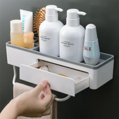 China Sustainable Multifunctional Plastic Bathroom Organizer Cosmetic Rack Bath Storage Holder with Drawer and Hook for sale