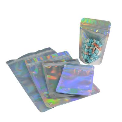 China MOQ 500 Clear Hologram Foil Moistureproof Stand Up Zipper Pouch Bag With Zip Lock 140x200+80mm for sale