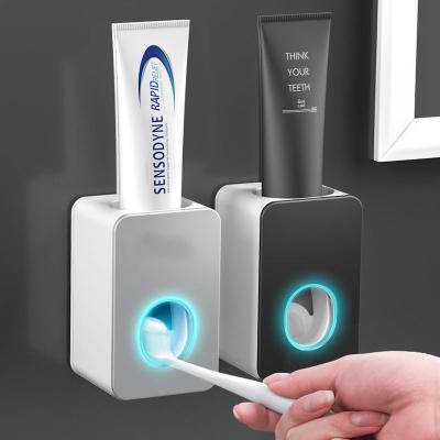 China New Style Modern Automatic Toothpaste Dispenser Wall Mounted Plastic Toothpaste Squeezer For Bathroom Accessories for sale