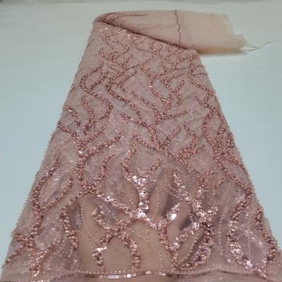 China Viable New Arrival Gorgeous Hand Knitted Pearl Lace Pattern Wedding Dress High End Fabric for sale