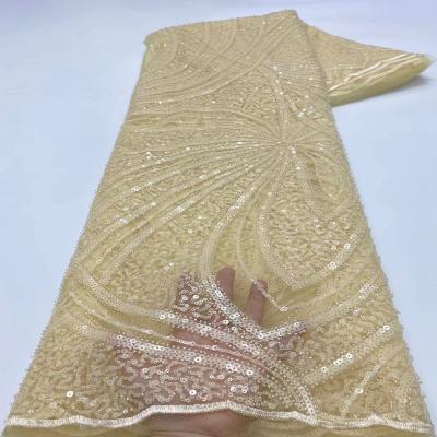 China New Sustainable Luxury Handmade Beads Lace Sequin Pattern High Quality Bridal Dress Fabric for sale