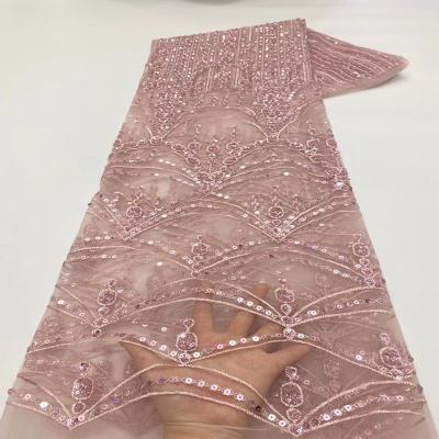 China New high quality viable elegant hand knitting mesh of embroidery sequin lace wedding dress for sale