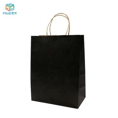 China Recyclable Wholesale Black Kraft Paper Gift Wrapping Paper Bag Shopping Paper Bag With Handles In Stock for sale