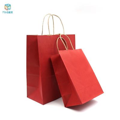 China Recyclable Wholesale High Quality Twisted Kraft Paper Bag Handle Gift Twisted Packaging Paper Bag for sale