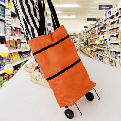 China Folding Tote Foldable Tug Bag Hide Portable Reusable Nylon Goods Rolled Trolley Shopping Trolley Folding Bag for sale