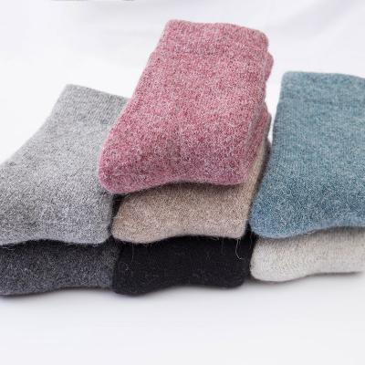 China Custom Made Mens Womens Wool Winter Warm Merino Wool Logo Socks Super Thicker Solid Knocks Merino Wool Bunny Socks Against Cold Snow for sale