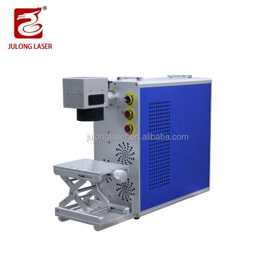 China Air-cooled small mini portable 50W fiber /fiber laser raycus metal laser marking machine with guaranteed good dark bearing/plastic/speed for sale