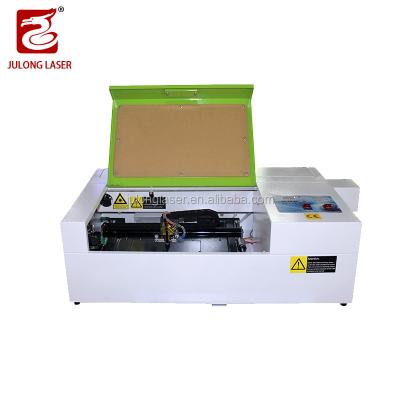 China Water Cooled 3020 Mini Portable Laser Engraving Machine With Laser Tube 40W 50W for sale