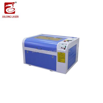 China New Product 60W/80W CO2 Water Cooled Laser Engraving Machine&Laser Cutting Machine For Felt Fabric Acrylic for sale