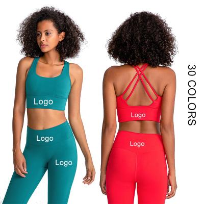 China New Breathable Logo Nude Women Custom Design 30 Colors Yoga Fitness Sets Cross Back Sports Bra Crotchless Yoga Pants Sets For Women for sale