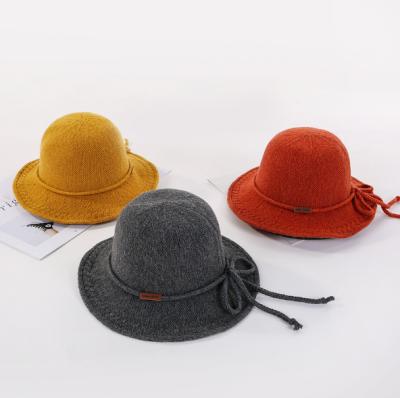 China NEW COMMON Style Bowknot Woolen Winter Color Bucket Knitting Outdoor Warm Pure Hats For Young Lady for sale