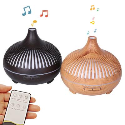 China 2022 7 Colors 500ml Humidifier Aroma Oil Diffuser Wood Led Air Humidifier Speaker With Remote for sale