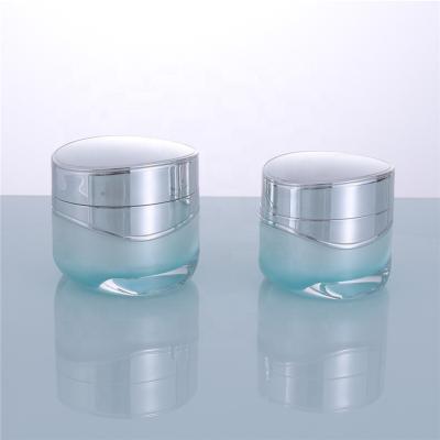 China Cosmetic Customized Acrylic Oval Jar Cosmetic Aqueous Blue Lotion Bottle for sale