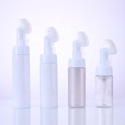 China Cosmetic Factory Wholesale Cylinder Facial Cleansing PET Foam Plastic Bottle With Brush for sale