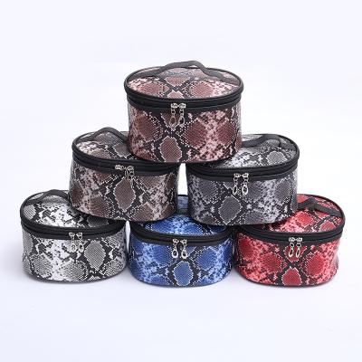 China New Snakeprint Large Capacity Makeup Bag Travel Waterproof Large Storage Bag PU Leather Cosmetic Bags for sale