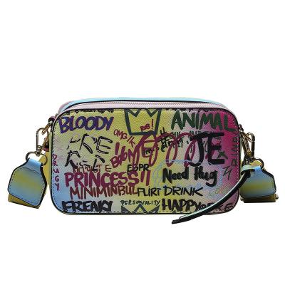 China 2021 Popular Newest Fashinable RTS Wholesale European Fashion Style Graffiti Personality Girl Sling Bag Messenger Bags For Women for sale