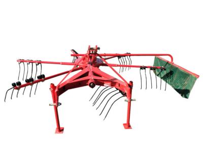 China Pupil Hay Rake For Sale driven by PTO, Mini Hay Rake, Straw Hay Rake Hay Tedder for sale