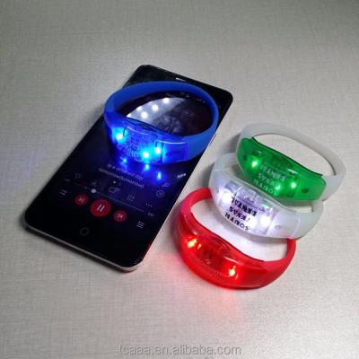 China Remote sound/motion/senor parts supplies colorful remote control led lighting bracelet music activated led wristband for sale