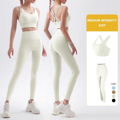 China Running Winter Gym Sets Fleece Women Fitness Breathable Quick Dry Backless Yoga Tops Pants U Neck Padded Shell Sports Bras Custom Warm for sale