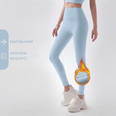 China Winter Breathable Custom Women High Waist Yoga Pants Running Fitness Gym Workout Skin Friendly Fleece Lined Leggings Hip Lift for sale