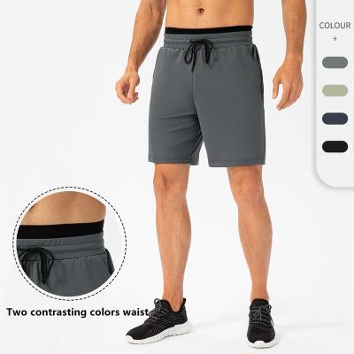 China QUICK DRY men's basketball shorts double-layer waist quick-drying training sports shorts casual men's five-point pants with pockets for sale