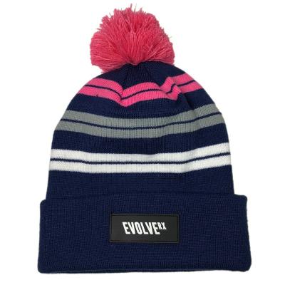 China OEM winter fashion COMMON acrylic knit stripe patch custom plain logo rubber beanie hat for sale