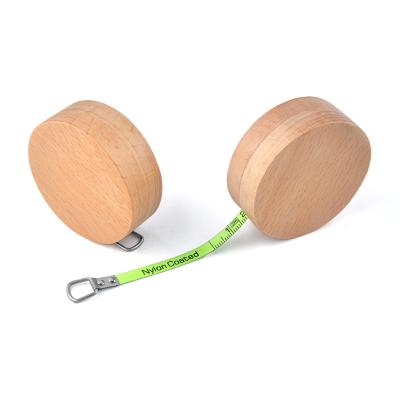 China Wintape Custom Round Wooden Mini Steel Tape Measure Stand Out From The Crowd 1m 3ft Fluorescent Green blade measurement Te koop