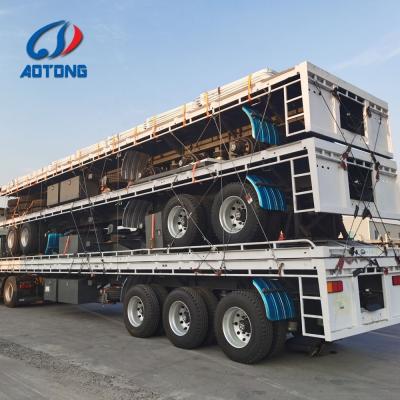 China 30 Years of Exporting 3 Axle 4 Axle Flat Bed Truck Semi Trailer from ISO9001 Certified for sale