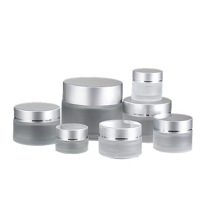 China 5g 10g 15g 20g 30g 50g 100g cosmetic packaging silver matte glass container cosmetic jar with screw cap lid for sale